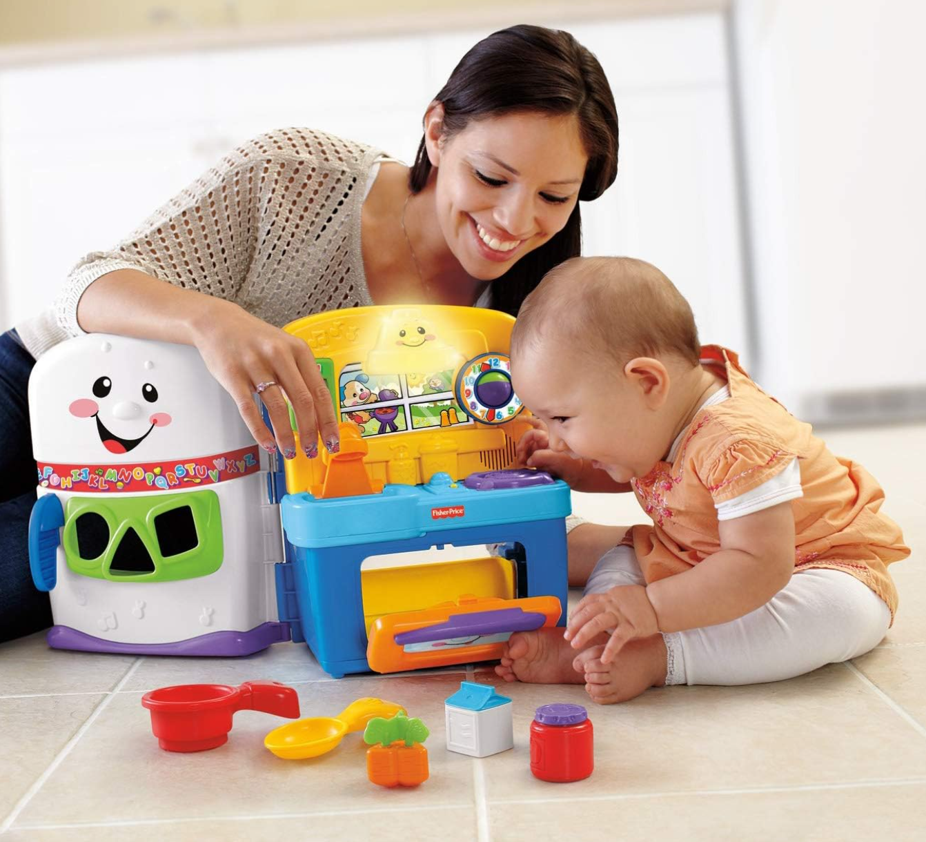 Fisher-Price Laugh & Learn Toddler Playset, Learning Kitchen with Music Lights & Bilingual Content for Baby to Toddler Pretend Play