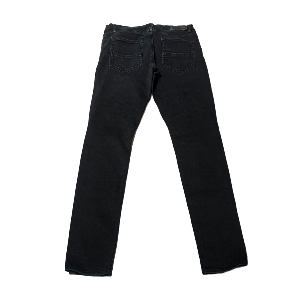 AMIRI 'BLACK' DISTRESSED SKINNY JEANS