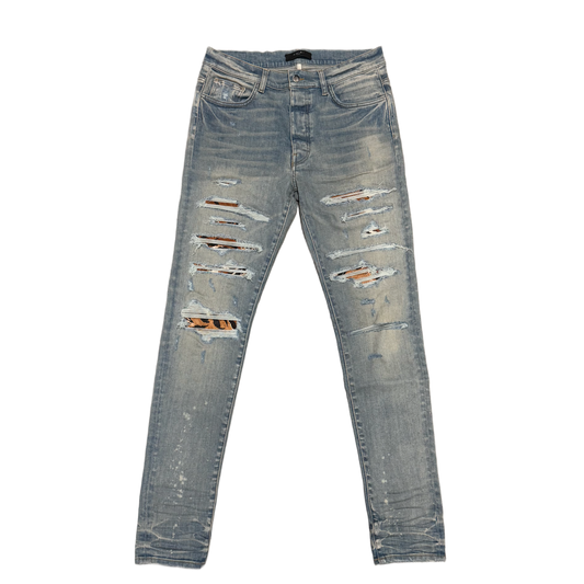 AMIRI 'TIGER PATCH THRASHER CLAY INDIGO' JEANS