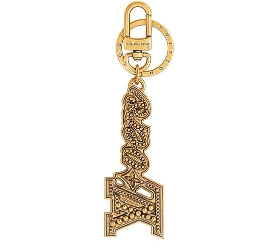 LOUIS VUITTON LV Vers Studs Bag Charm & Key Holder - Image 1