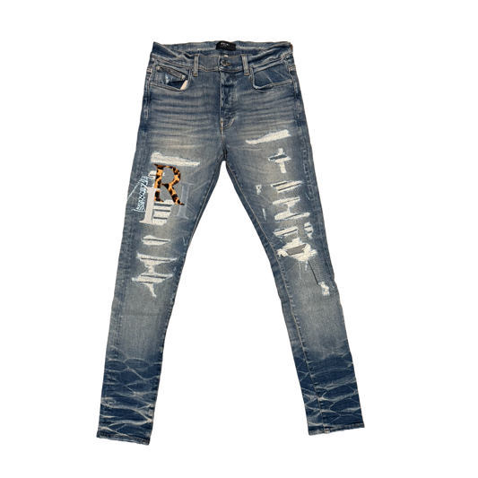 AMIRI 'VINTAGE INDIGO MULTICOLOR LEATHER STAGGERED LOGO' JEANS