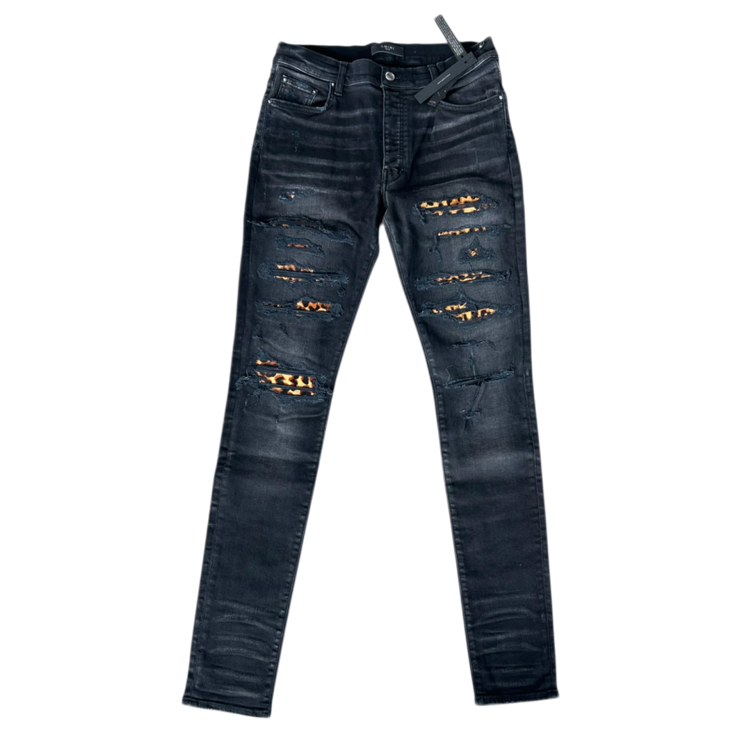 AMIRI 'LEOPARD PATCH AGED BLACK THRASHER' JEANS