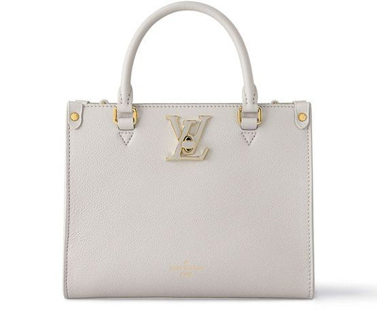 LOUIS VUITTON Lock & Go - Image 1