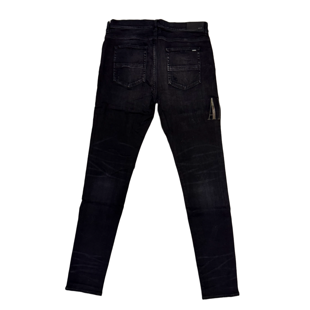 AMIRI 'AGED BLACK APPLIQUED CAMO' JEANS