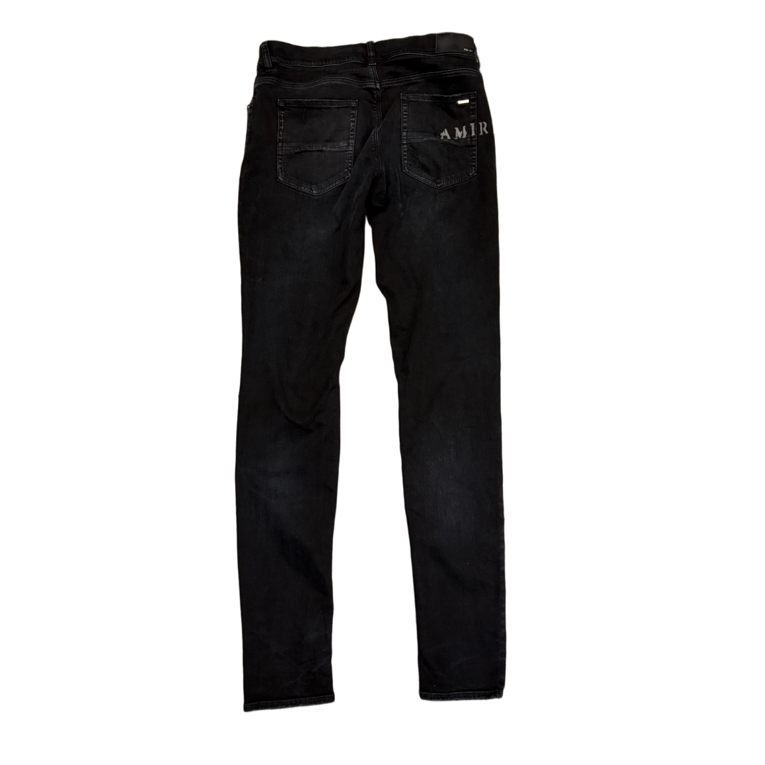 AMIRI 'BLACK' HIBISCUS FLOWER STENCIL JEANS
