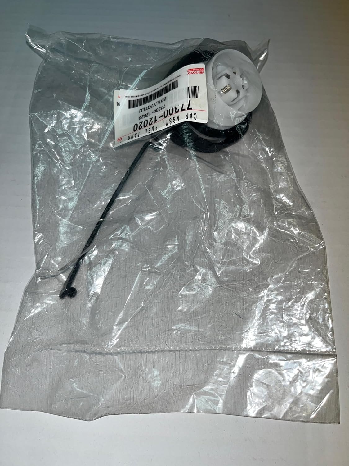 Genuine Toyota Fuel Tank Cap ASSY Part Number: 77300-12020