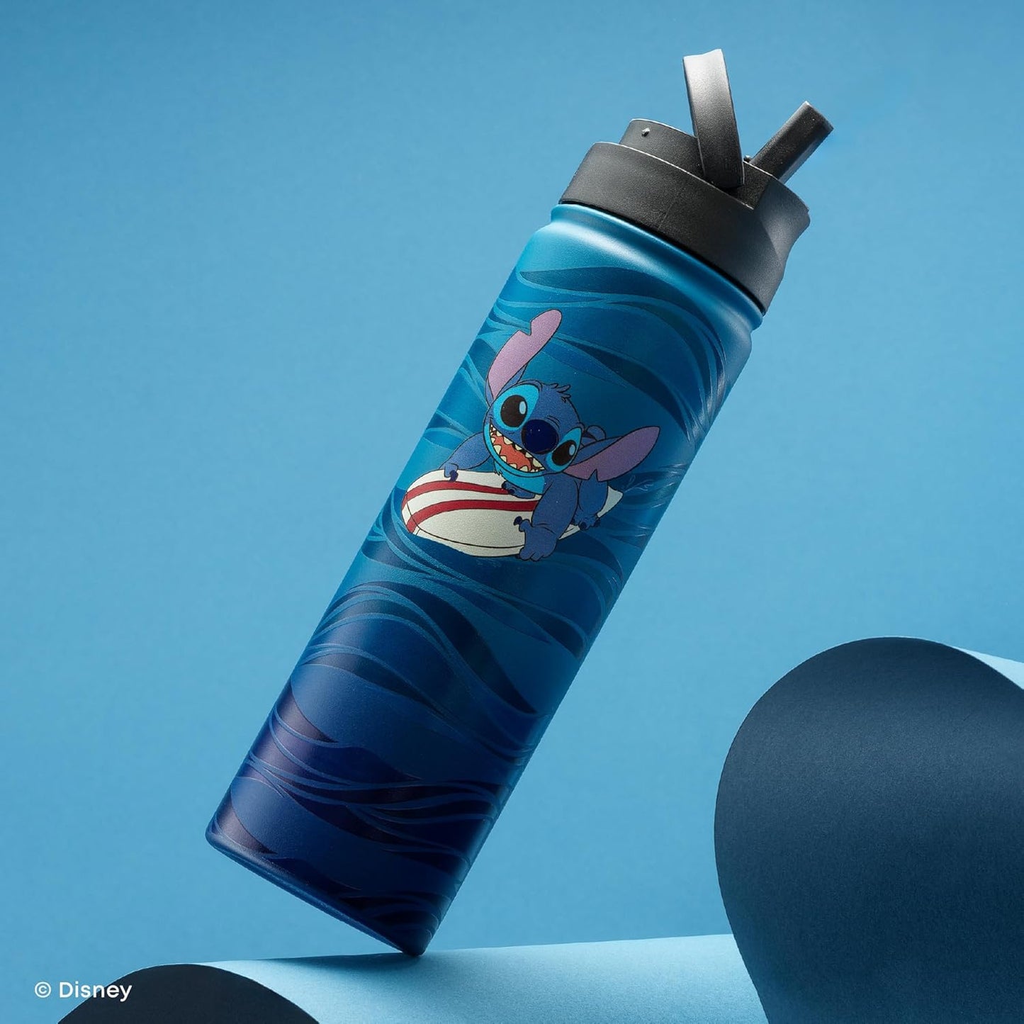 JoyJolt Disney Stitch Surf's Up - Botella de agua de acero inoxidable con tapa abatible, botella de agua aislada al vacío de 22 onzas, vaso sin BPA para escuela, gimnasio, deportes y viajes, regalos